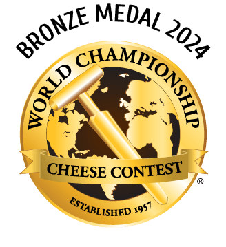 Gold Medal 2024 award from the World Championship Cheese Contest with gold medal and world map.